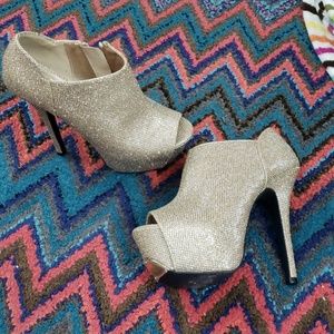 Gold stilettos booties